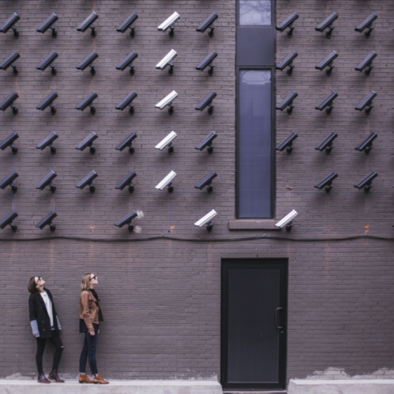 Picture of Women With Surveillance Cameras - Free Stock Photo Image: ‘Two women staring at a wall full of surveillance cameras’ by Matthew Henry // Burst 