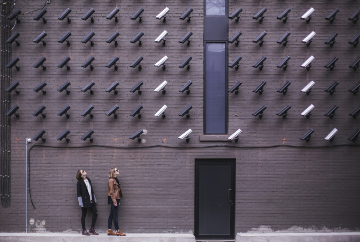 Picture of Women With Surveillance Cameras - Free Stock Photo Image: ‘Two women staring at a wall full of surveillance cameras’ by Matthew Henry // Burst 